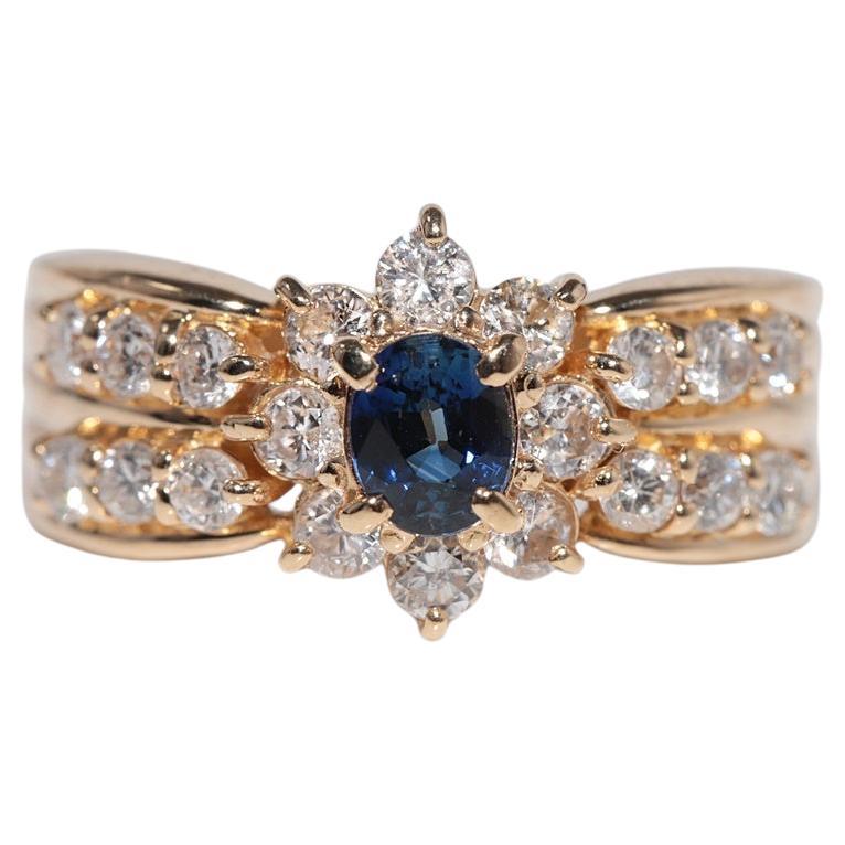 Anillo vintage circa años 90 de oro de 18k con diamante natural y zafiro talla oval