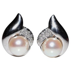 Orecchino decorato con diamanti naturali e perle in oro 18k, vintage, circa anni 
90