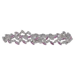 Pulsera vintage de los años 90, de oro de 18 quilates, decorada con diamantes naturales y rubíes