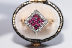 Anillo Navette Vintage Circa 1990s Oro 18k Decorado con Diamantes Naturales y Rubíes