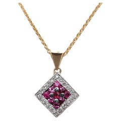 Vintage Circa 1990s 18k Gold Natural Diamond And Ruby Decorated Pendant Necklace