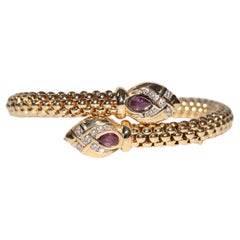 Vintage Circa 1990s 18k Gold Natural Diamond And Ruby Decorated Snake Bracelet