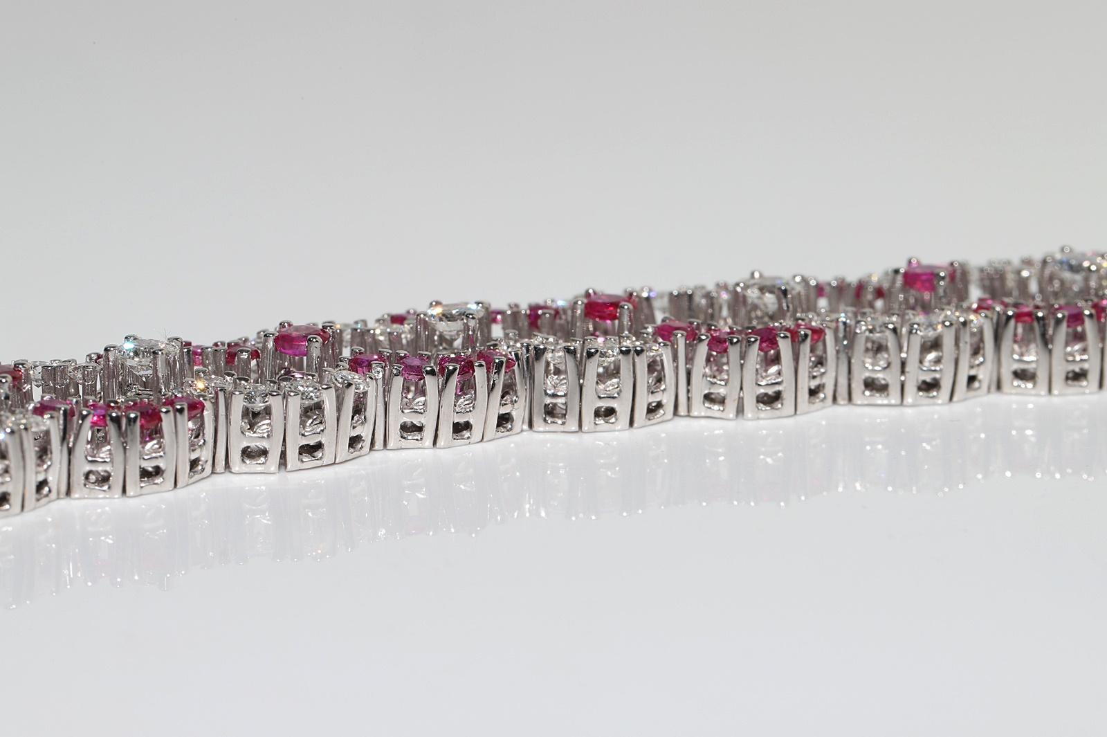 Vintage Circa 1990s 18k Gold Natural Diamond And Ruby Decorated Tennis Bracelet For Sale 5