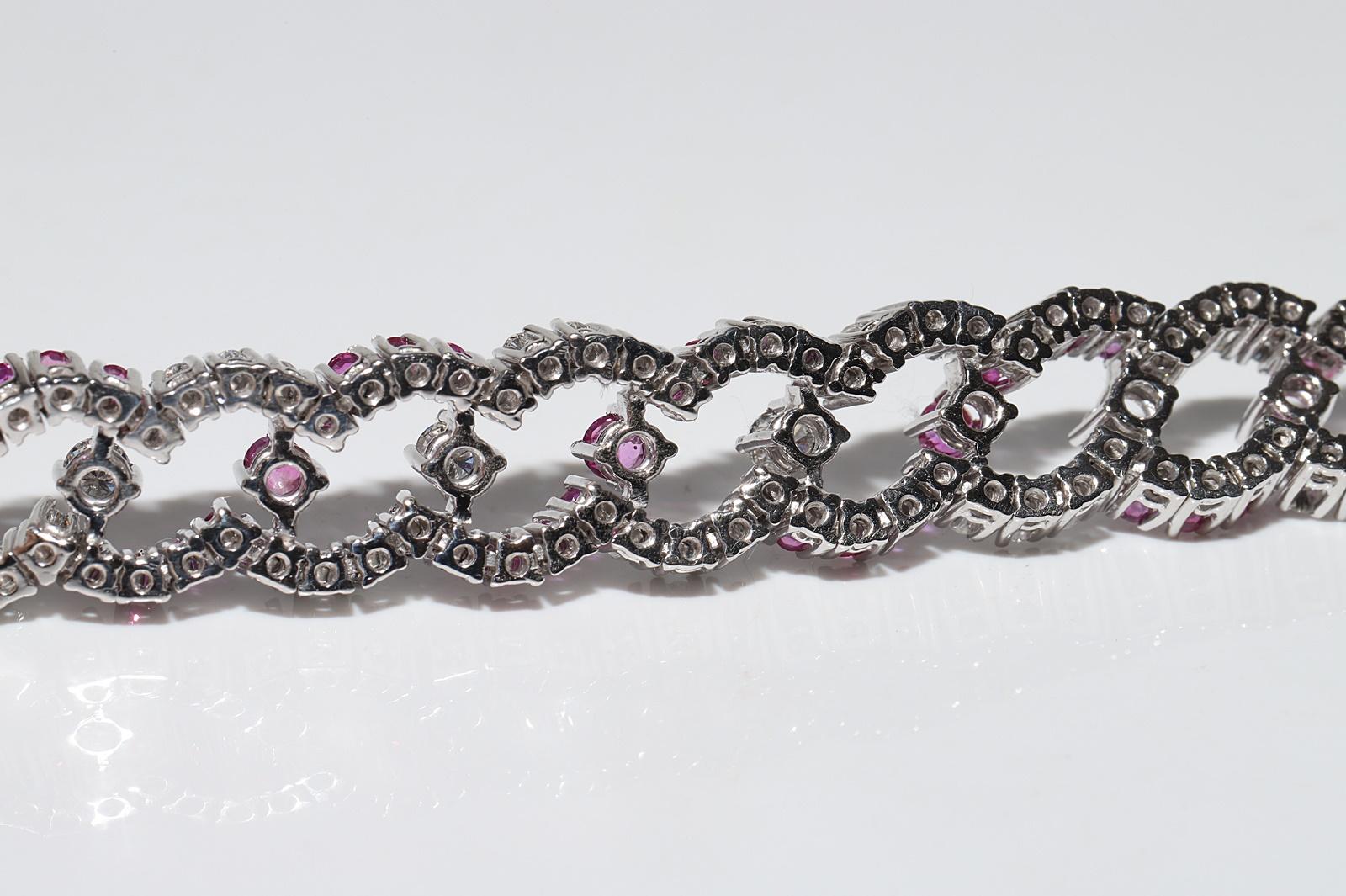 Vintage Circa 1990s 18k Gold Natural Diamond And Ruby Decorated Tennis Bracelet For Sale 8