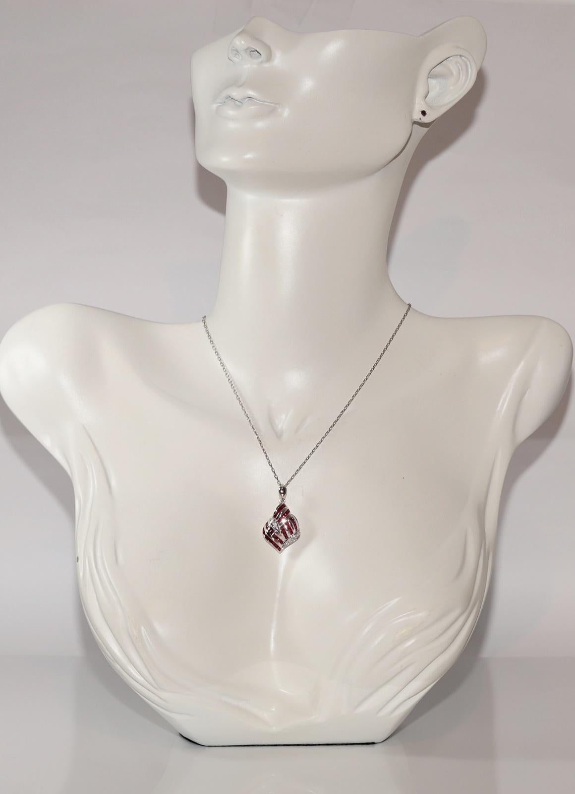 In very good condition.
Total weight is 8 grams.
Totally is diamond 0.20 ct.
The diamond is has G-H color and vs clarity.
Totally is ruby 1.50 ct.
Total lenght is chain 45 cm.
Please contact for any questions.