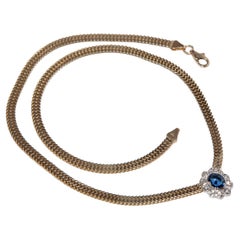 Collana con ciondolo in oro naturale e zaffiro, vintage, circa anni '90, in oro 18 ct.