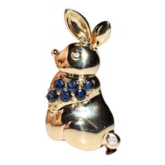 Vintage des années 1990, or 18 carats, diamant naturel et saphir  Broche Lapin