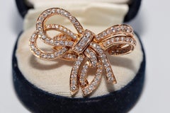 Vintage Circa 1990s 18k Gold Natural Diamond Decorated Bow Design Strong Ring