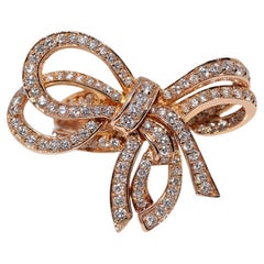 Vintage Circa 1990s 18k Gold Natural Diamond Decorated Bow Design Strong Ring