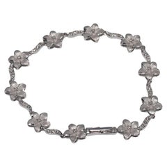 Vintage Circa 1990s 18k Gold Natural Diamond Decorated Flowers Design Bracelet