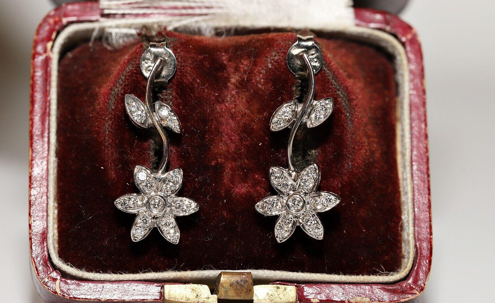 Vintage Circa 1990 Boucle d'oreille fleurs en or 18k décorées de diamants naturels en vente 4