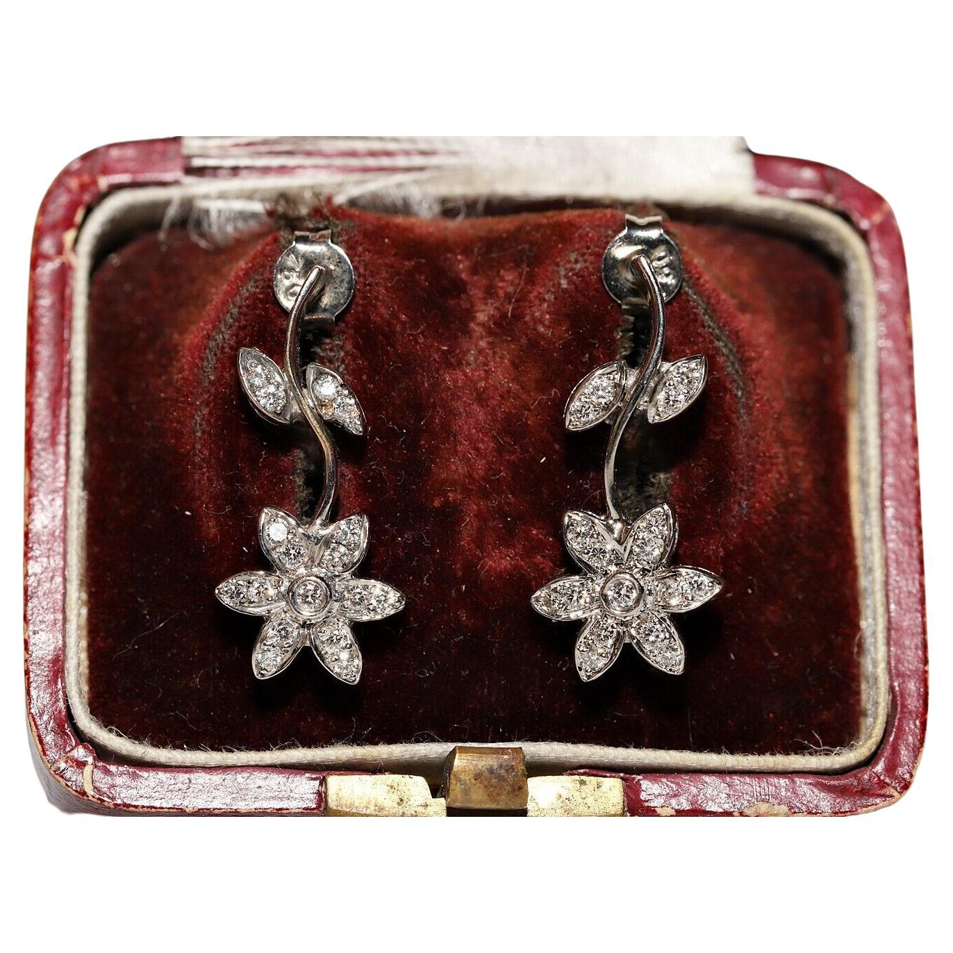 Vintage Circa 1990 Boucle d'oreille fleurs en or 18k décorées de diamants naturels en vente