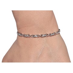 Vintage Circa 1990s 18k Gold Natural Diamond Decorated Tennis Bracelet