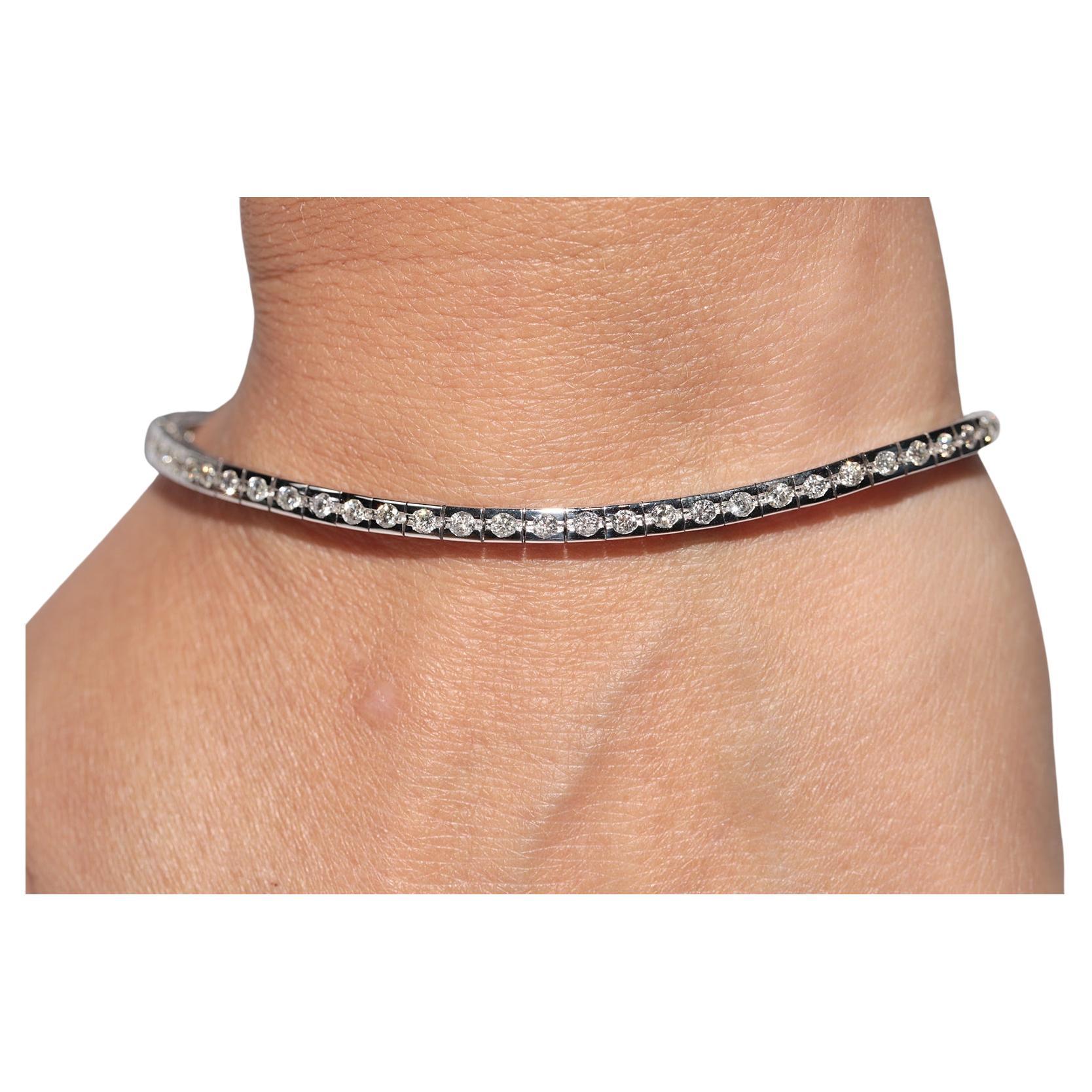 Pulsera de tenis vintage circa años 90 de oro de 18 quilates decorada con diamantes naturales