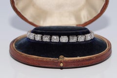 Vintage Circa 1990 Bracelet Tennis Design en or 18k orné de diamants naturels