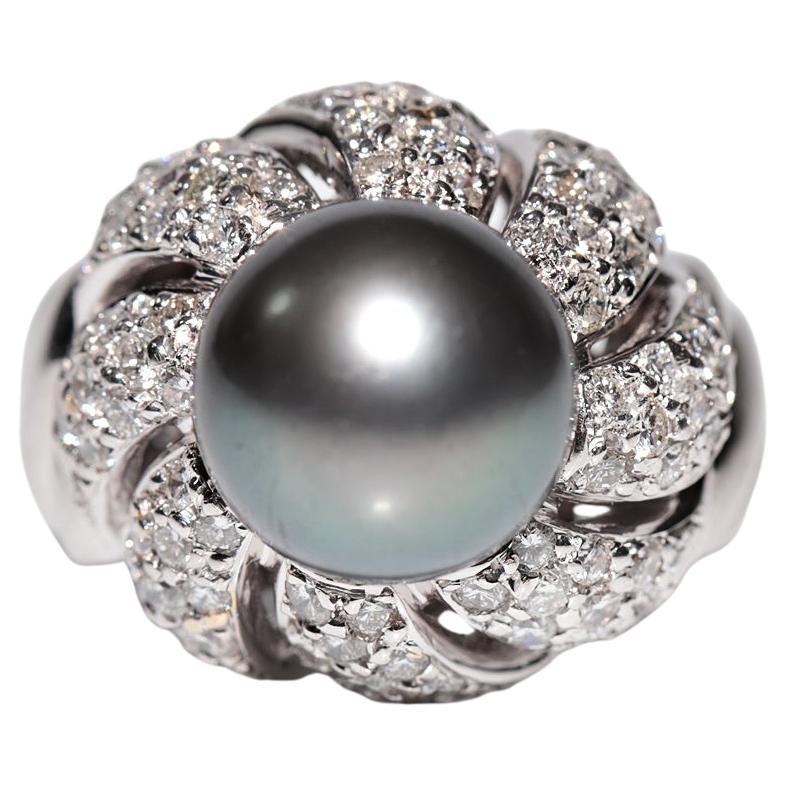 Vintage CIRCA gli anni
90: anello con diamante naturale e perla in oro 18k