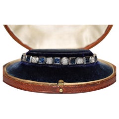 Retro Circa 1990s 18k Gold Natural Diamond Sapphire Decorated Bracelet