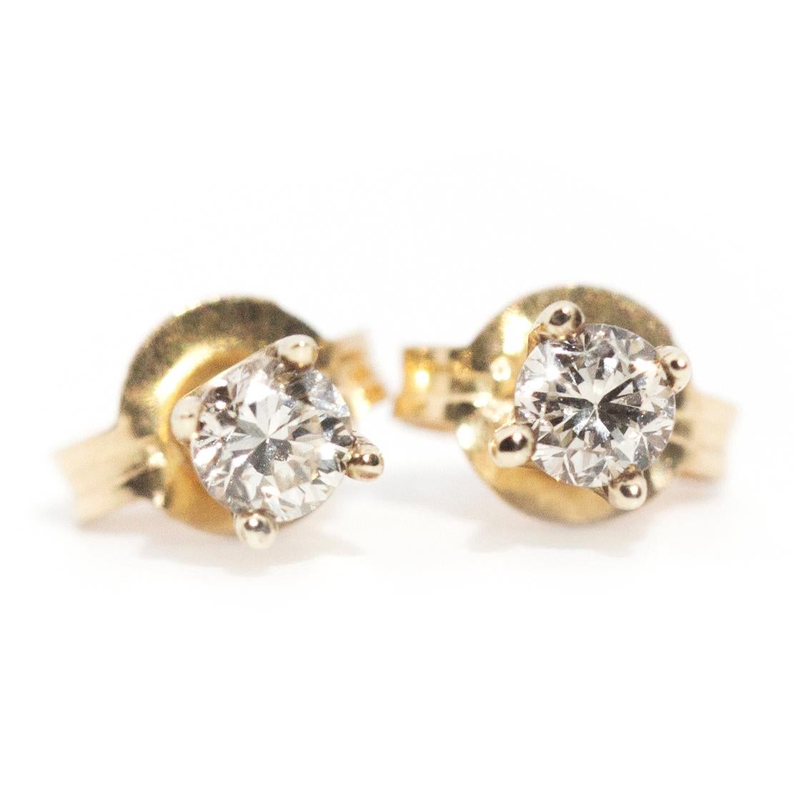 Modern Vintage Circa 1990s 9 Carat White Gold Solitaire Diamond Stud Style Earrings