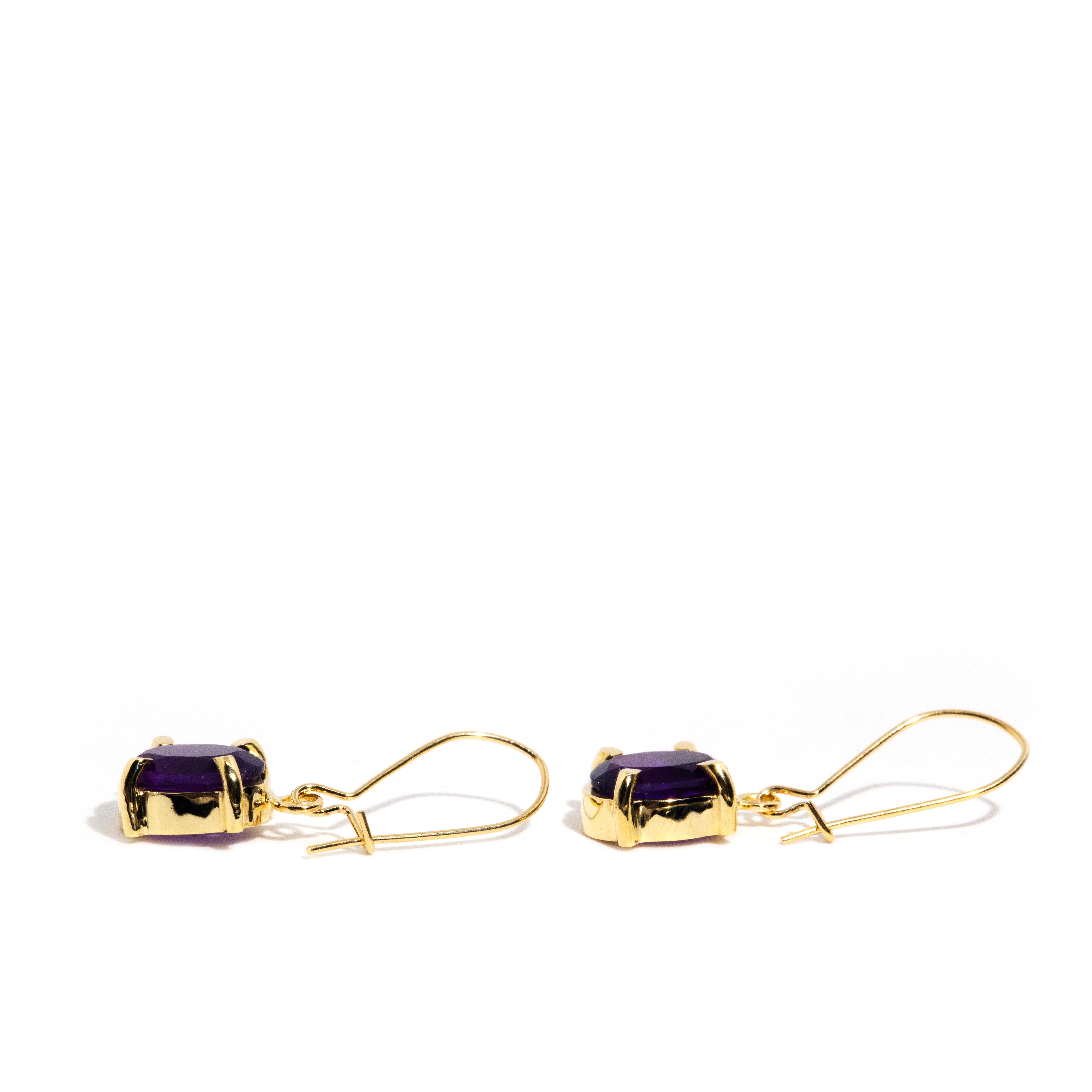Oval Cut Vintage Circa 1990s 9 Carat Yellow Gold Amethyst Continental Hook Style Earrings
