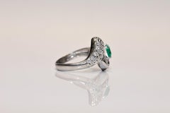 Vintage Circa 1990s Handcrafted Platinum Natural Diamond And Emerald Ring