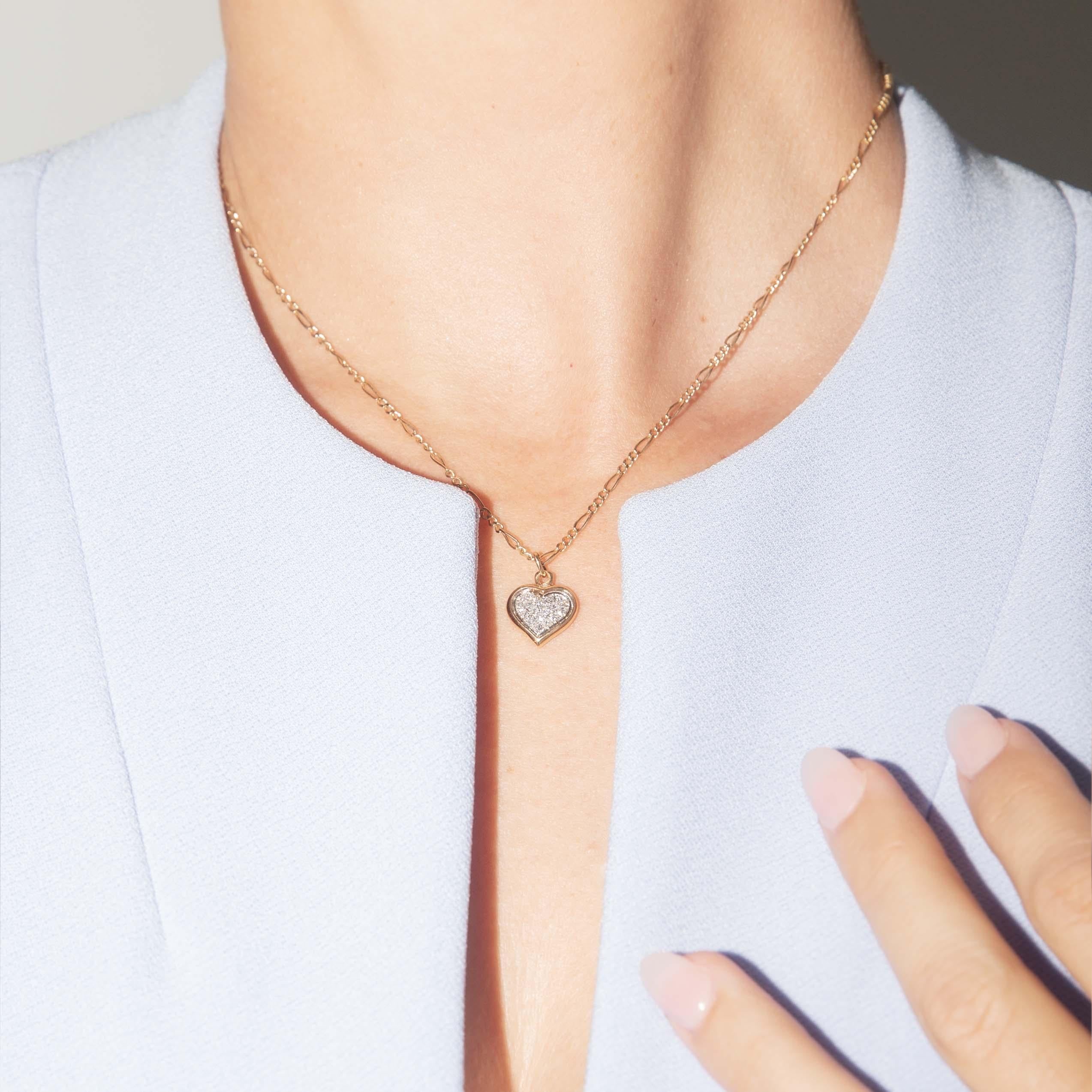 Illuminate your essence with the 18 carat gold Echo Heart Cluster Pendant, where golden whispers entwine with vibrant gemstones, capturing the heart's deepest rhythms. As light dances across each facet, you’ll feel an embrace of elegance and warmth.