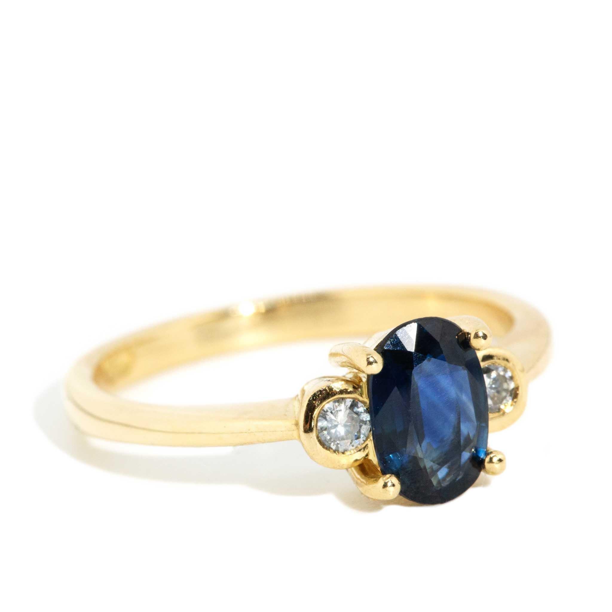 Modern Vintage Circa 1990s Oval Deep Blue Sapphire & Diamond Ring 18 Carat Yellow Gold