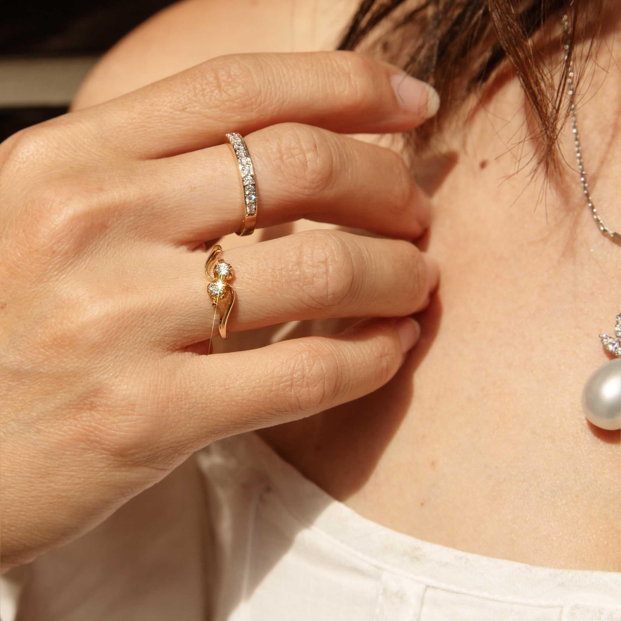 Our Belle Ring is the perfect circle of love for one of life's biggest occasions. Crafted in 18 carat yellow gold, diamonds shimmer, their light dancing in celebration. A beautiful way to say 