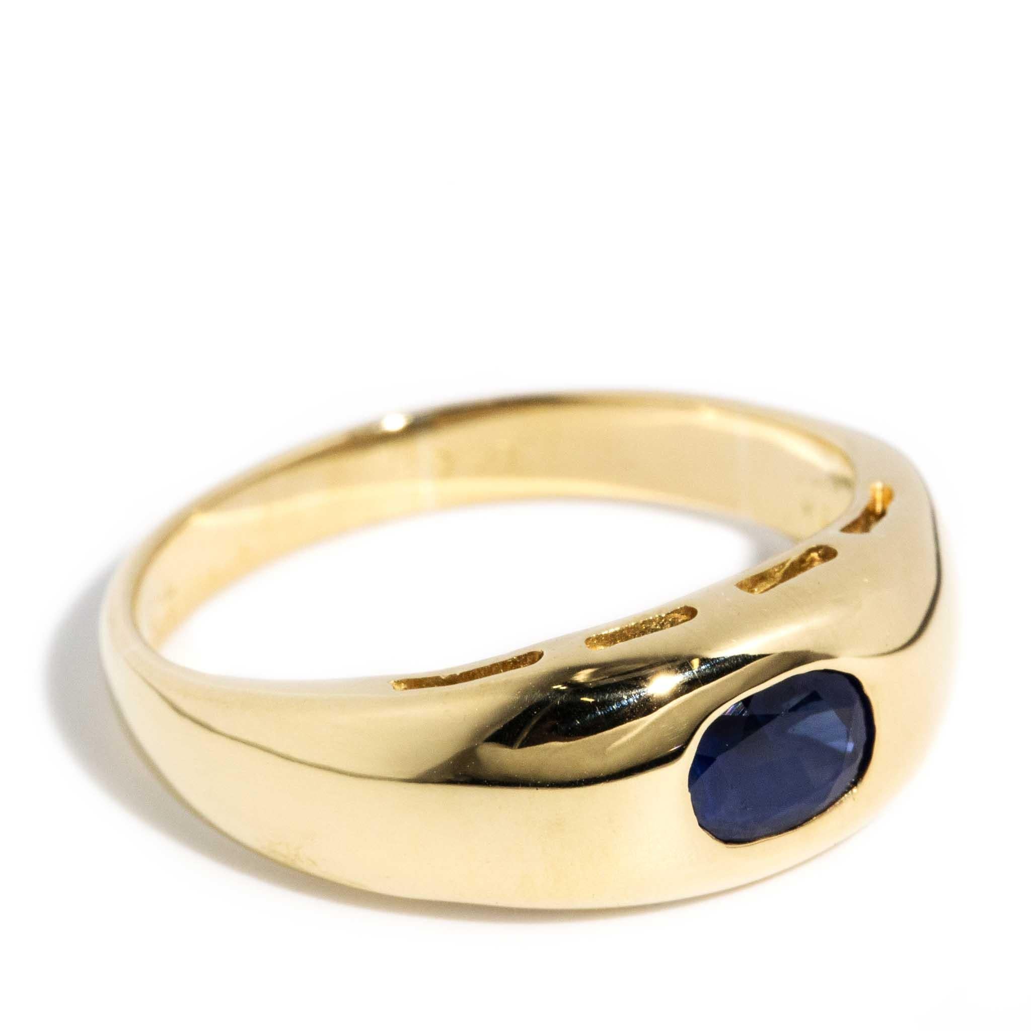 Modern Vintage Circa 1990s Rubover Oval Sapphire Domed Band 18 Carat Yellow Gold For Sale
