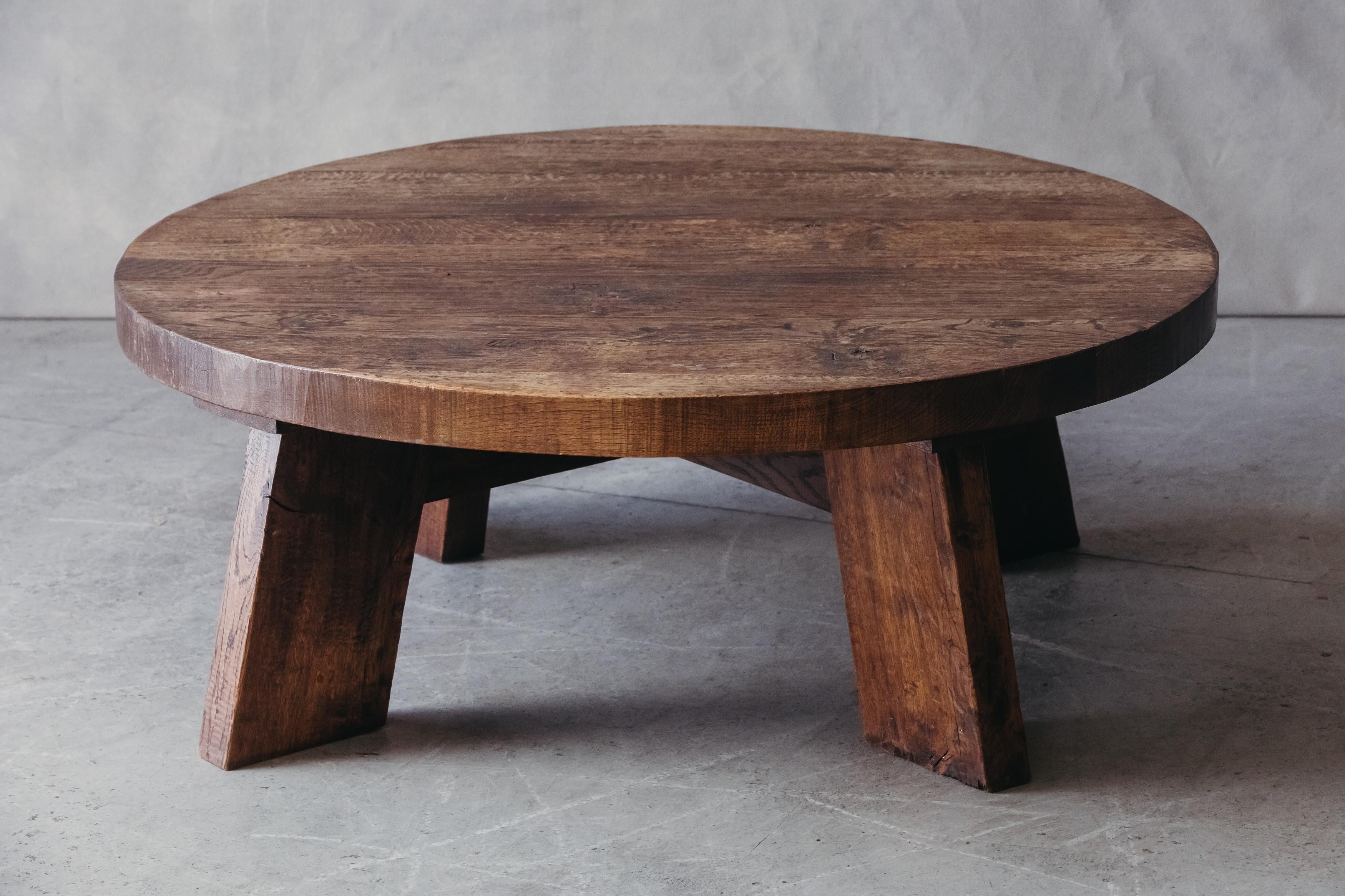 Vintage circular coffee table from france, circa 1970. Solid oak construction with light wear and use.

We don't have the time to write an extensive description on each of our pieces. We prefer to speak directly with our clients. So, If you have any
