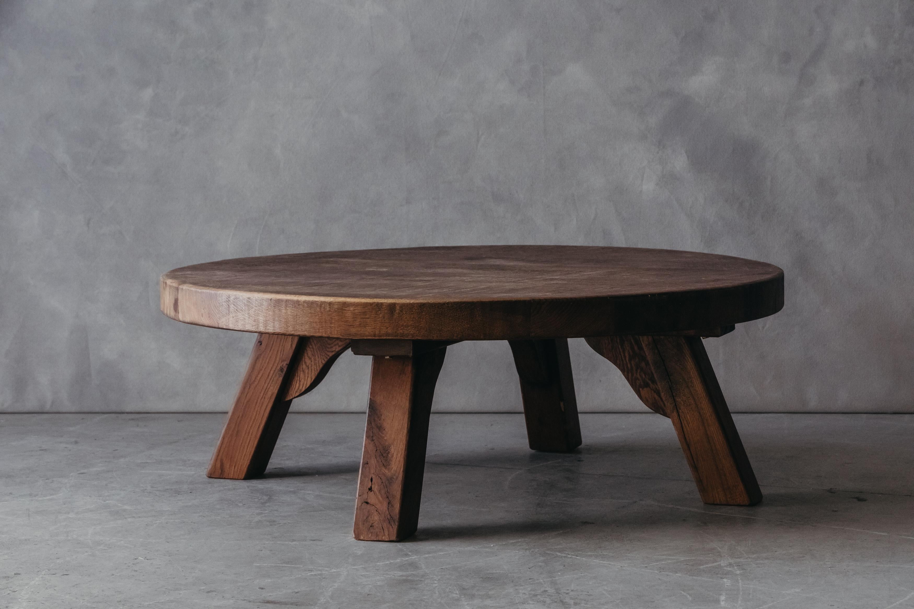 Vintage circular coffee table from France, circa 1970. Solid oak construction with light wear and use. 

We don't have the time to write an extensive description on each of our pieces. We prefer to speak directly with our clients. So, If you have
