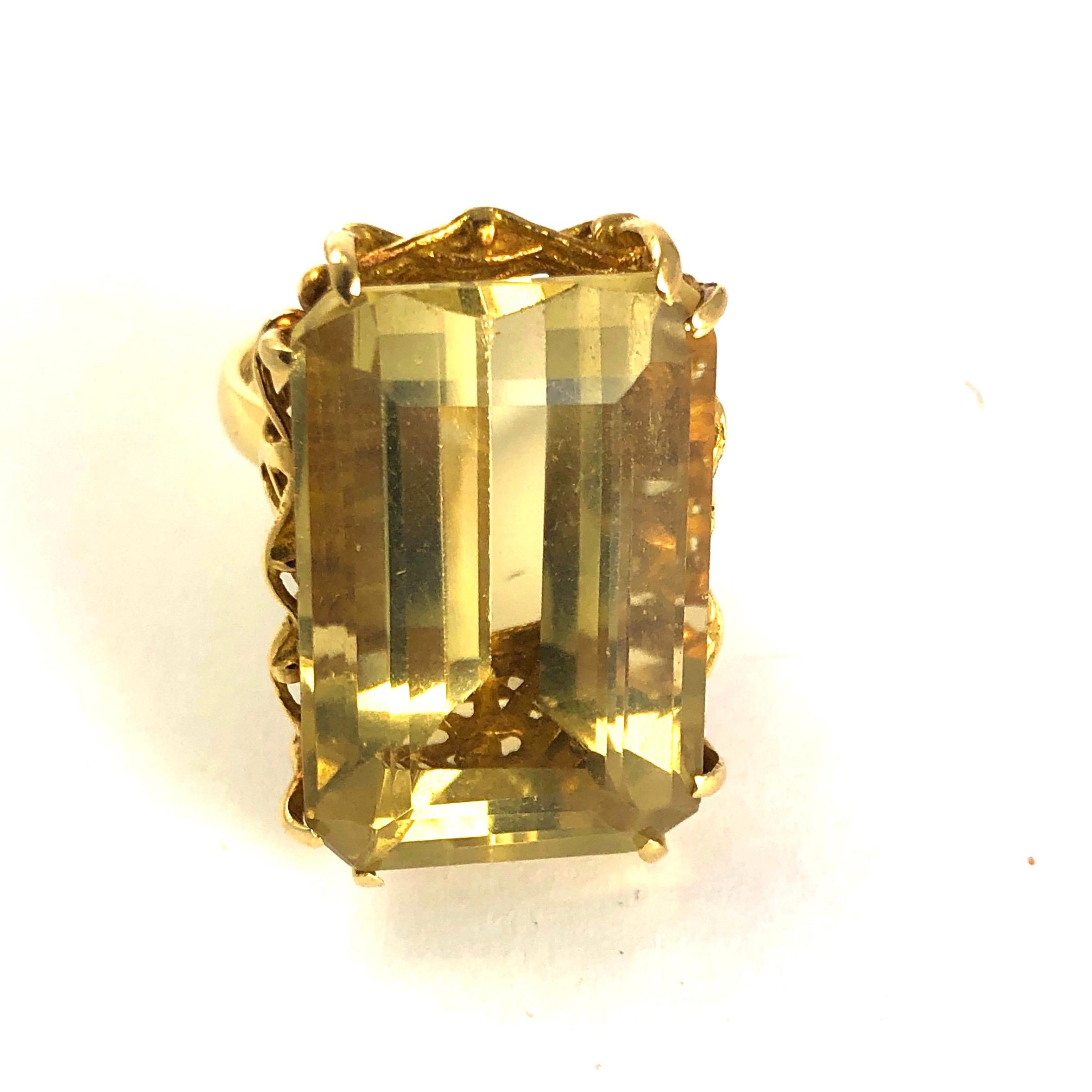 The setting this ring is made up of stunning basket weave detail which cradles the gorgeous yellow citrine stone. The detail is exquisite and unusual. Measuring 32carats the citrine is large and so eye-catching.

Ring Size: Q or 8

Weight: 15.1g
