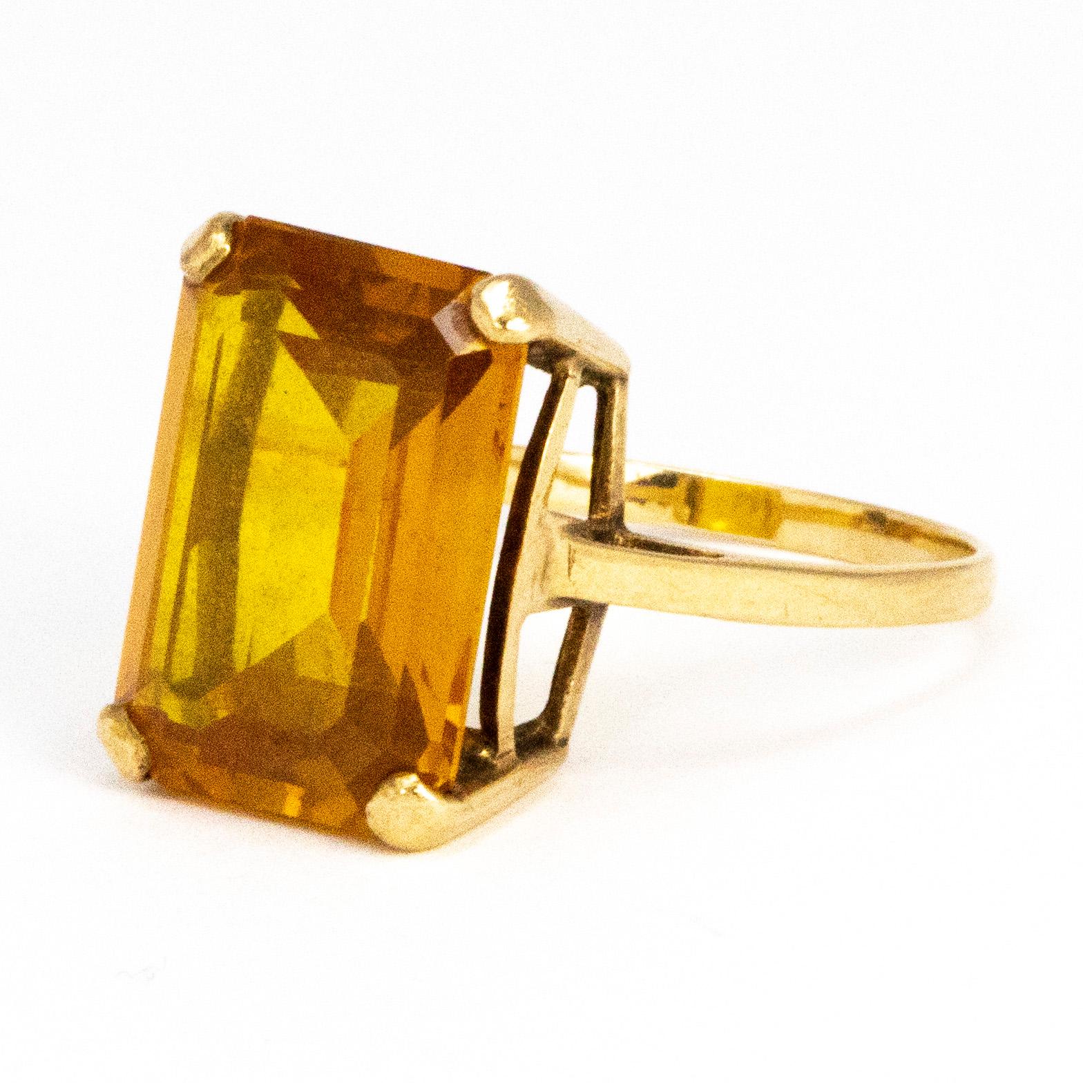 The rich coloured citrine stone is held by a very delicate claw at each corner of the stone. The rings modelled in 9ct gold and the setting and ring is a very simple design. 

Ring Size: P or 7 3/4
Stone Dimensions: 12mm x 16mm 