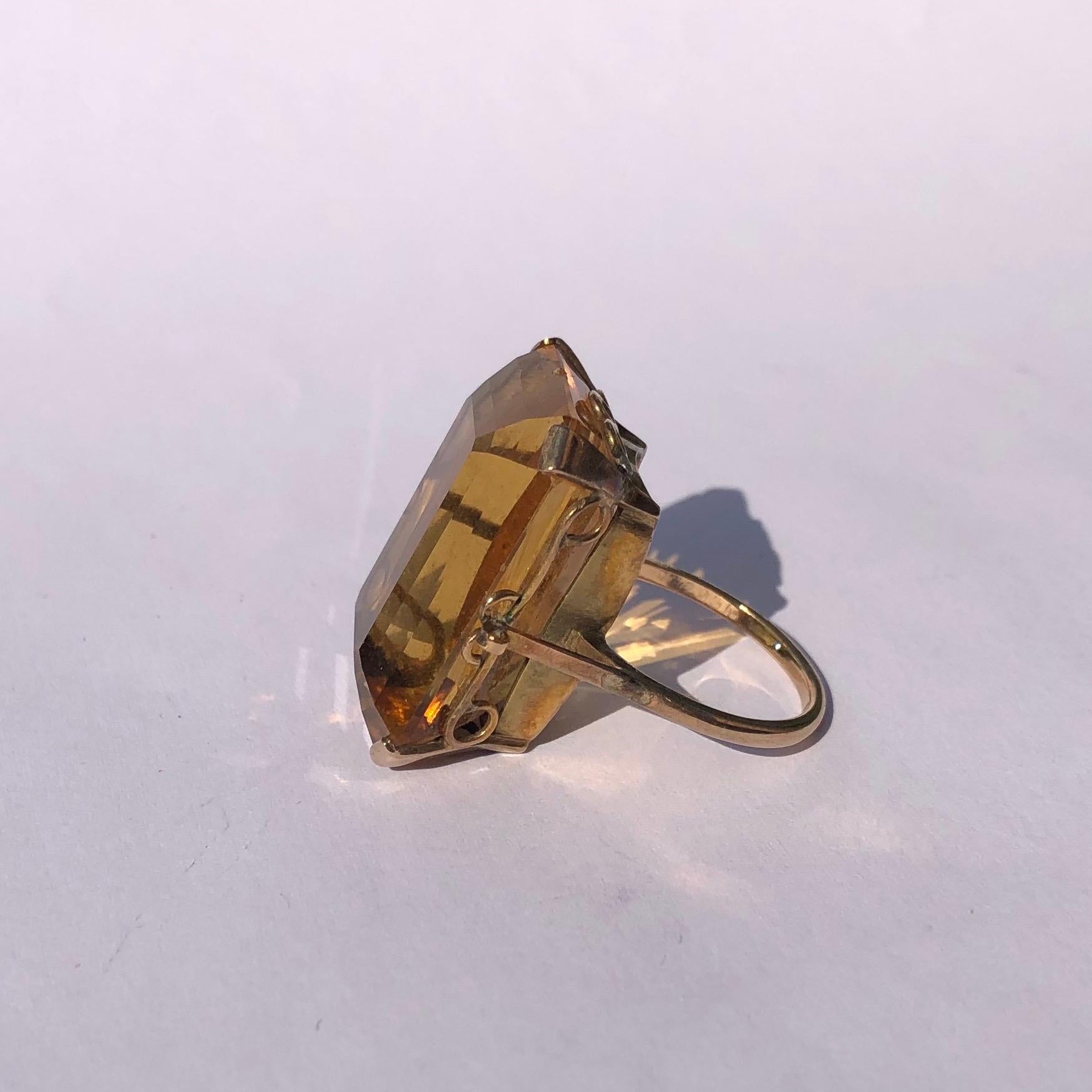 The rich coloured citrine stone is held by a very delicate claw at each corner of the stone. The rings modelled in 9ct gold and the setting and ring is a very simple design. 

Ring Size: P or 7 3/4
Stone Dimensions: 25mm x 17mm 
Height Off Finger: