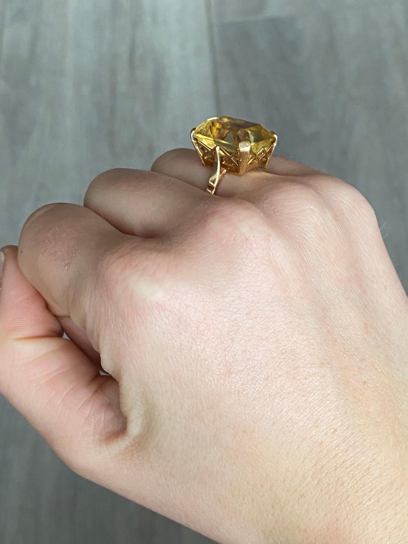 The gorgeous citrine stone in this ring is a lemon yellow colour and is set in simple claws. The gallery is ornate and all modelled in 9carat gold. 

Ring Size: M or 6 1/4
Stone Dimensions: 18x13.5mm
Height Off Finger: 10mm 

Weight: 6.6g