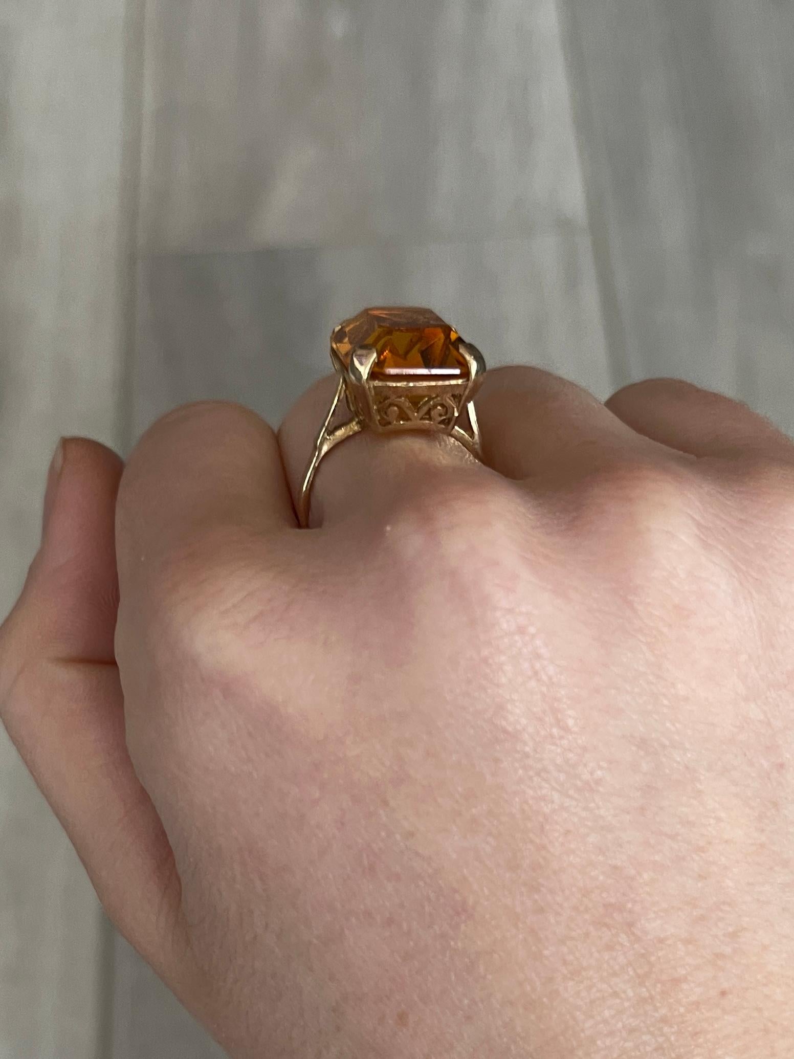 The gorgeous citrine stone in this ring is a muted yellow colour and is set in simple claws. The gallery is open and all modelled in 9carat gold. 

Ring Size: K or 5 1/4 
Stone Dimensions: 18x13mm
Height Off Finger: 9mm 

Weight: 5g