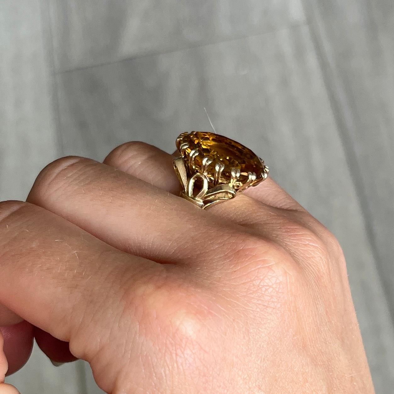 The gorgeous citrine stone in this ring is a lemon yellow colour and is set in double claws. The gallery holds so much detail and is modelled in 9carat gold. 

Ring Size: J 1/2 or 5 
Stone Dimensions: 15x20mm
Height Off Finger: 8mm 

Weight: 8.2g