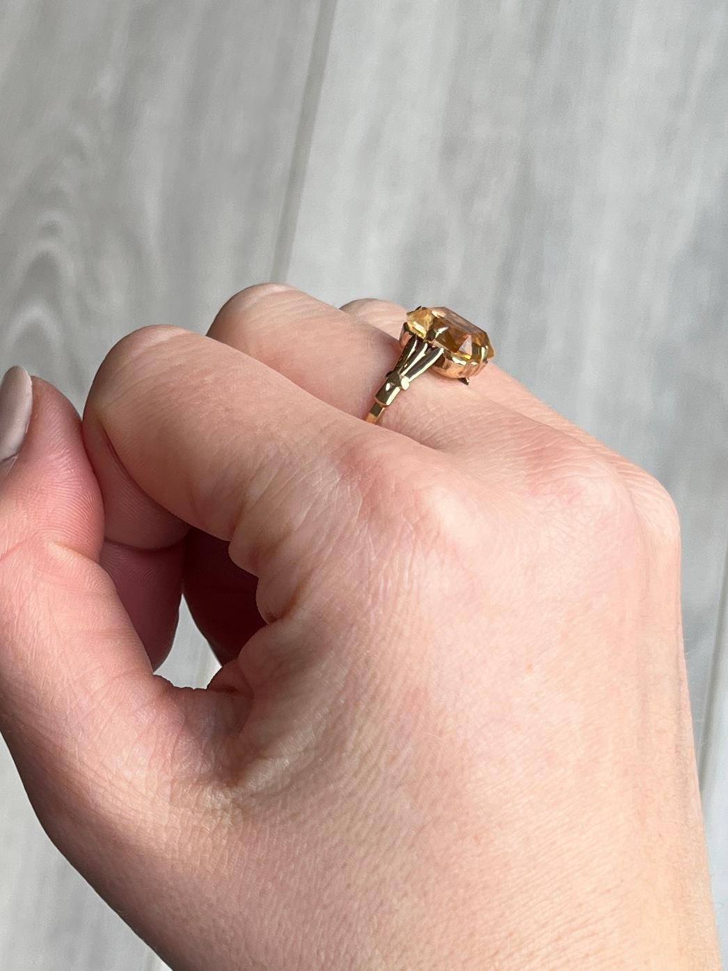 The gorgeous citrine stone is a bright yellow colour set in simple claws. 

Ring Size: N or 6 3/4 
Stone Dimensions: 11x9mm
Height Off Finger: 5.5mm 

Weight: 1.9g