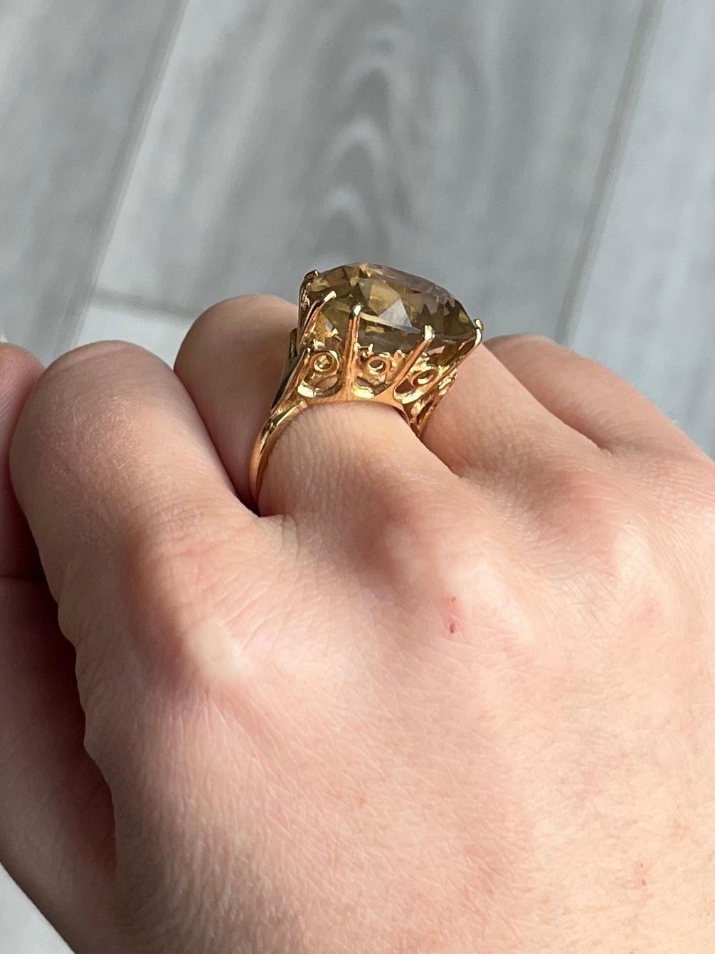 The gorgeous citrine stone in this ring is a deep yellow colour and is set in multiple claws. The gallery holds so much detail and is modelled in 9carat gold. Hallmarked London 1970.

Ring Size: M or 6 1/4 
Stone Dimensions: 19x14mm
Height Off