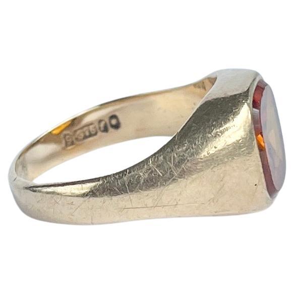 The gorgeous citrine stone in this ring is a deep amber colour and is set within the chunky gold ring. Modelled in 9carat gold and fully hallmarked London 1961.

Ring Size: Q or 8 1/4
Stone Dimensions: 10x10mm
Height Off Finger: 4mm 

Weight: 6.6g