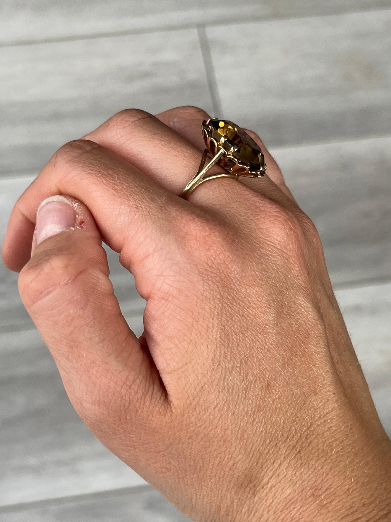 The gorgeous citrine stone is a soft yellow colour set in claws. Modelled in 9carat gold. 

Ring Size: O or 7 1/4 
Stone Dimensions: 18x14mm
Height Off Finger: 9mm 

Weight: 6g