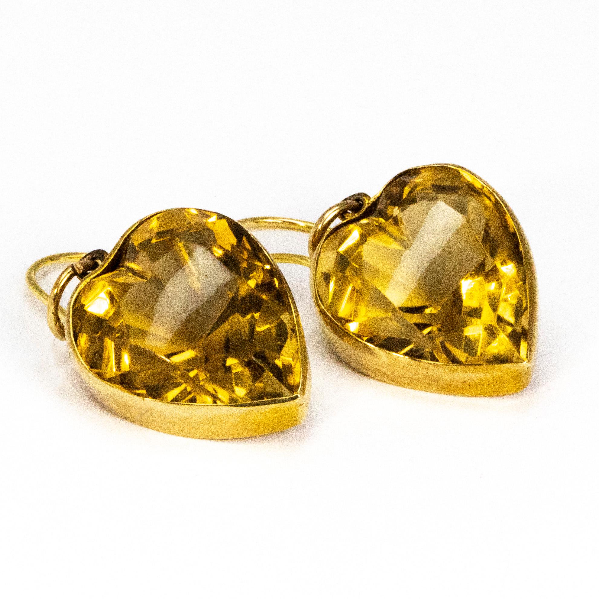 These gorgeous drop earrings feature a gorgeous bright citrine stone which is in the shape of a heart. The stones are attached using a shepherds hook.

Stone Dimensions: 14.5 x 17mm 