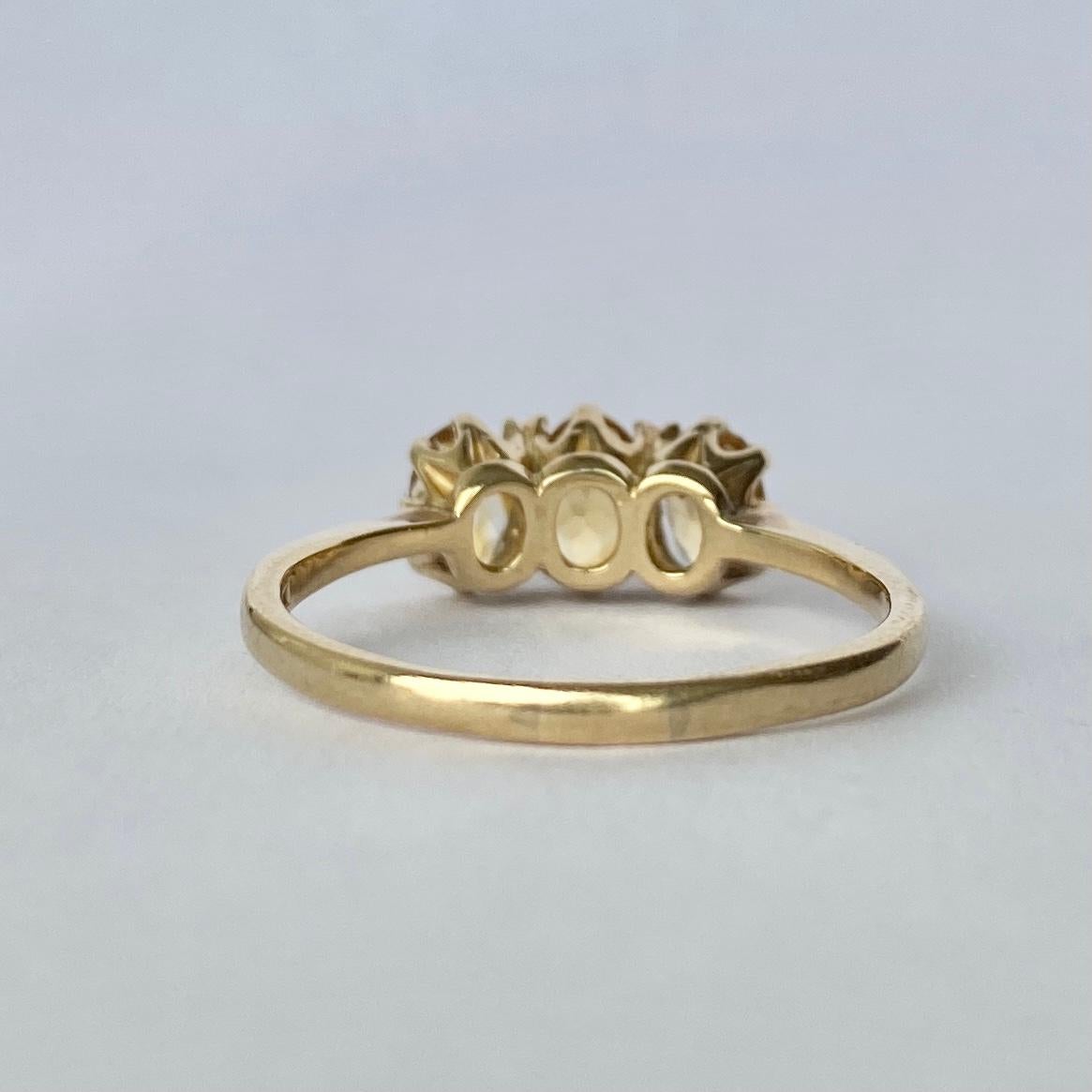 This lovely three stone ring holds three rich yellow citrine stones totalling 1.5carat. Modelled in 9carat gold and made in Sheffield, England. 

Ring Size: R 1/2 or 9 
Height Off Finger: 5mm

Weight: 2.8g