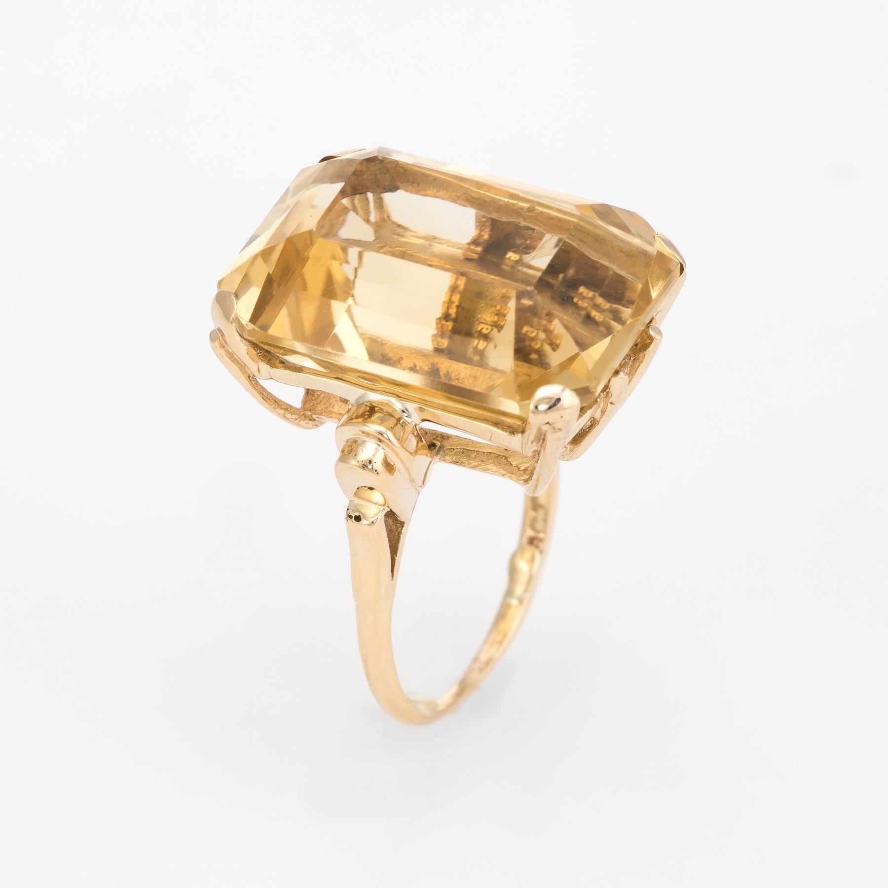 Dramatic large vintage statement cocktail ring (circa 1950s to 1960s), crafted in 9k karat yellow gold. 

Centrally mounted emerald cut citrine measures 20mm x 15mm (estimated at 25 carats). The citrine is in excellent condition and free of cracks