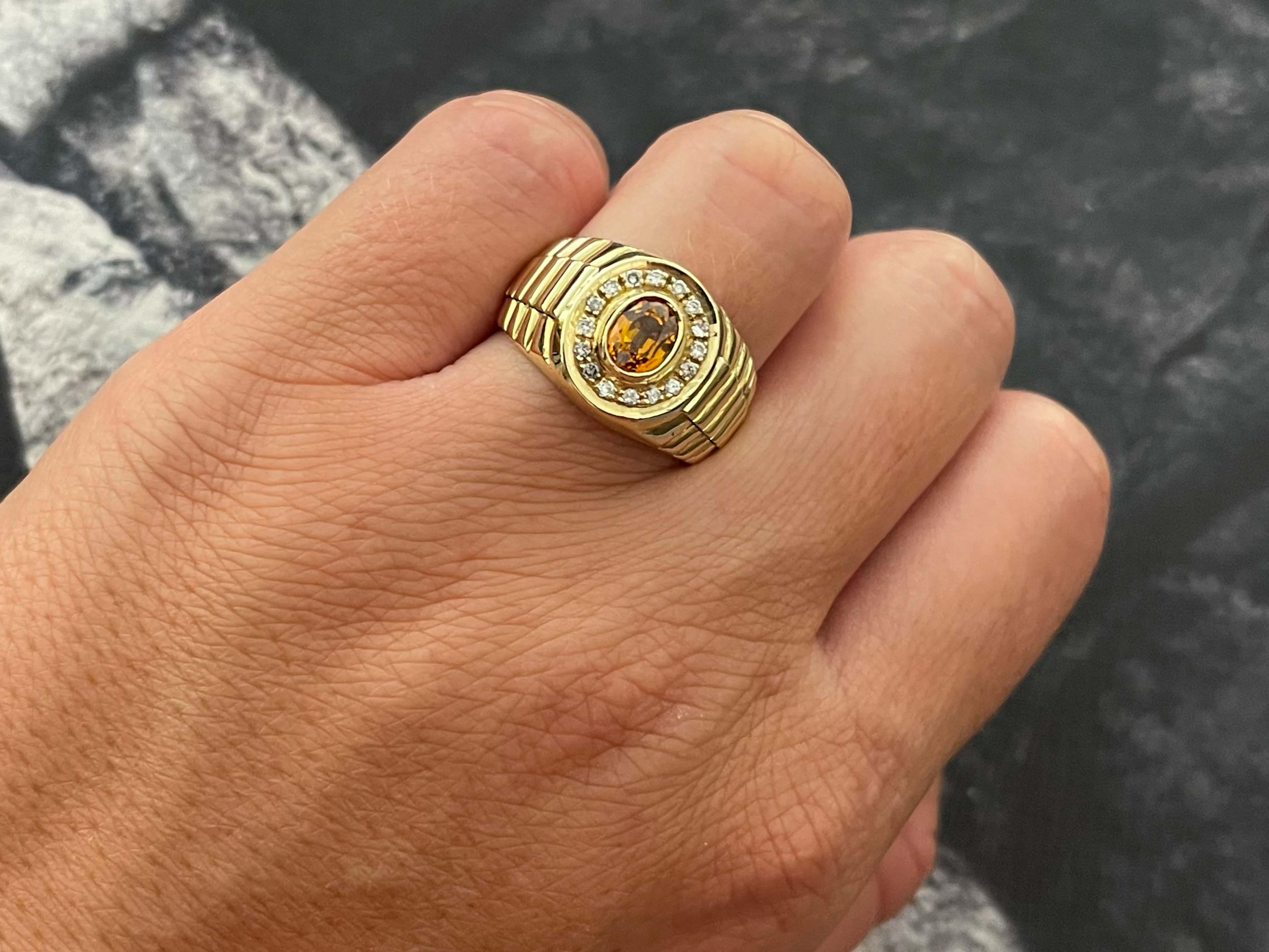 Item Specifications:

Metal: 14k Yellow Gold

Style: Statement Ring

Ring Size: 8.75 (resizing available for a fee)

Total Weight: 10 Grams

Gemstone Specifications: Citrine 

Citrine Carat Weight: 0.61 carats

Color: Golden Orange

Cut: Oval