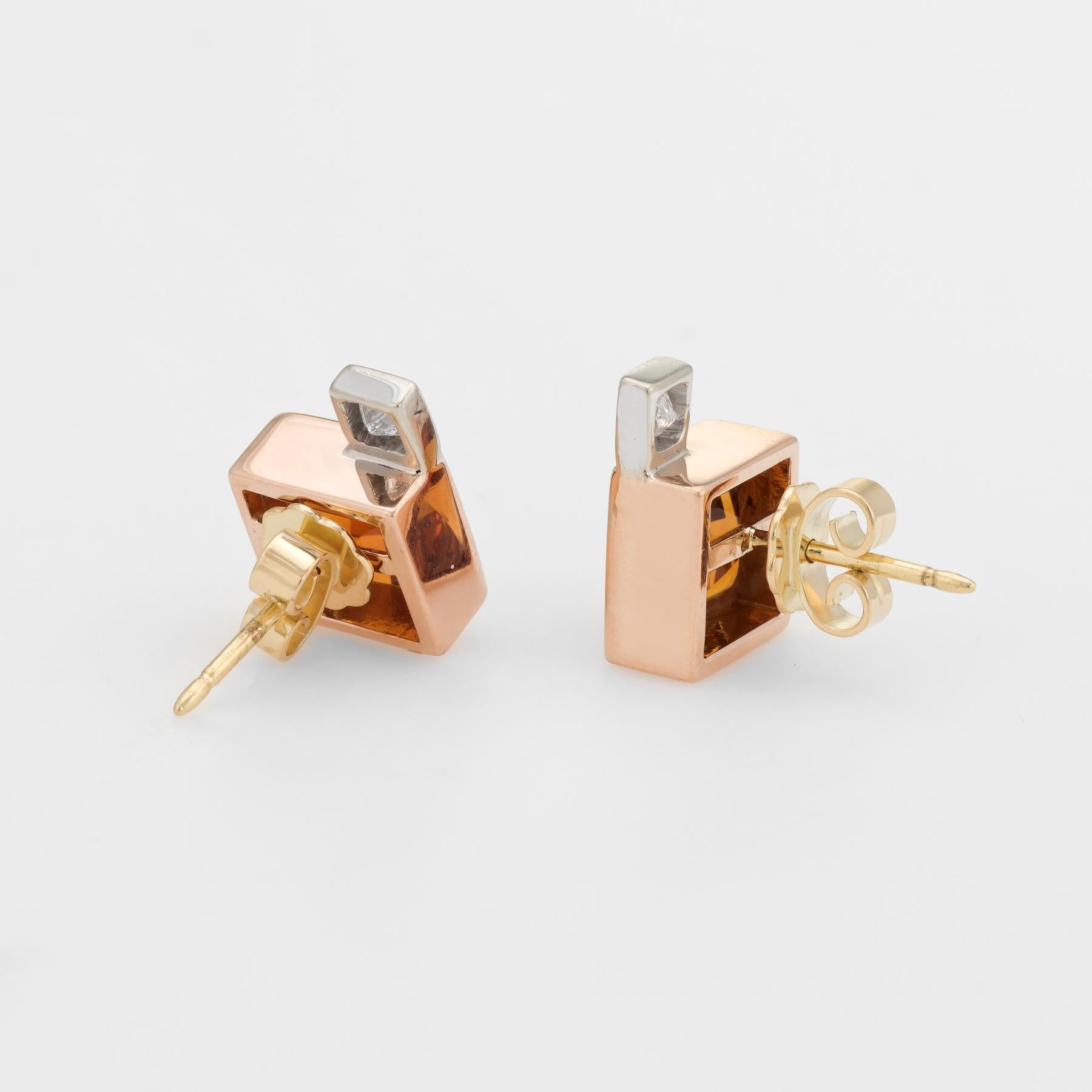 Elegant pair of vintage square stud earrings, crafted in 18k yellow gold. 

Checkerboard faceted citrine measures 8mm diameter (estimated at 2.50 carats each - 5 carats total estimated weight), accented with two estimated 0.15 carat princess cut