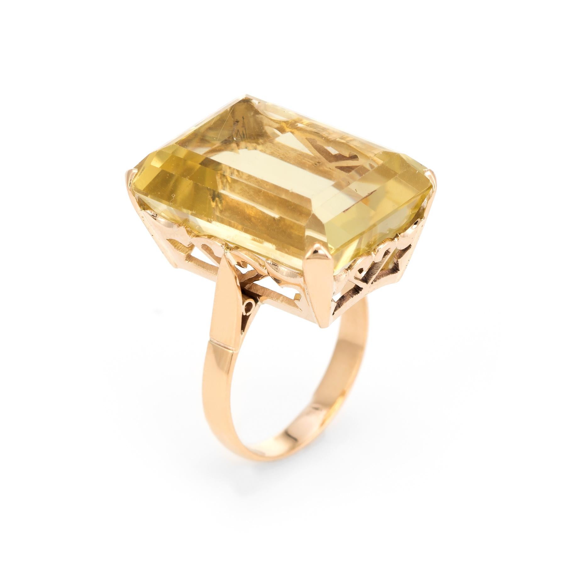 Circa 1950s to 1960s, a large statement cocktail ring is crafted in 18 karat yellow gold. 

The large emerald cut citrine measures 20mm x 15mm and is estimated at 25 carats. The citrine is in excellent condition and free of cracks or chips.  

The