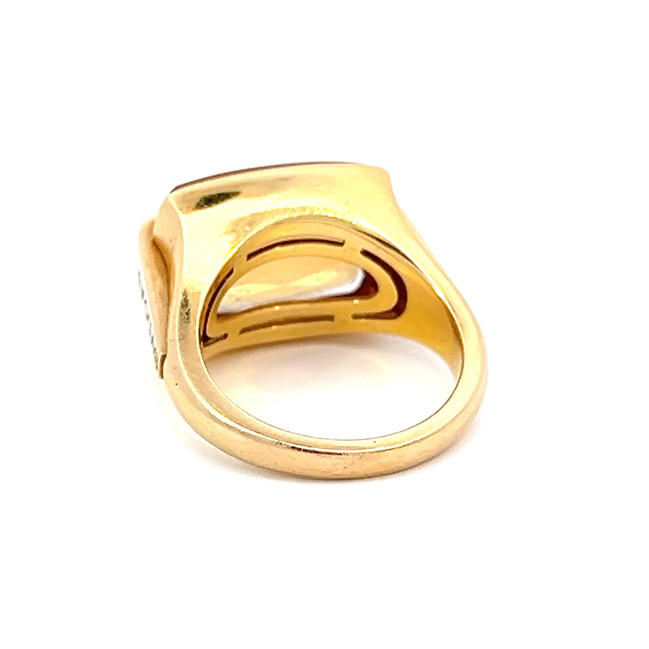 This vintage Bvlgari 18k gold ring is a real show-stopper. Featuring a stunning citrine gemstone, this one-of-a-kind design will make you the envy of all your friends! Treat yourself to a timeless piece of luxury and sparkle like never before!