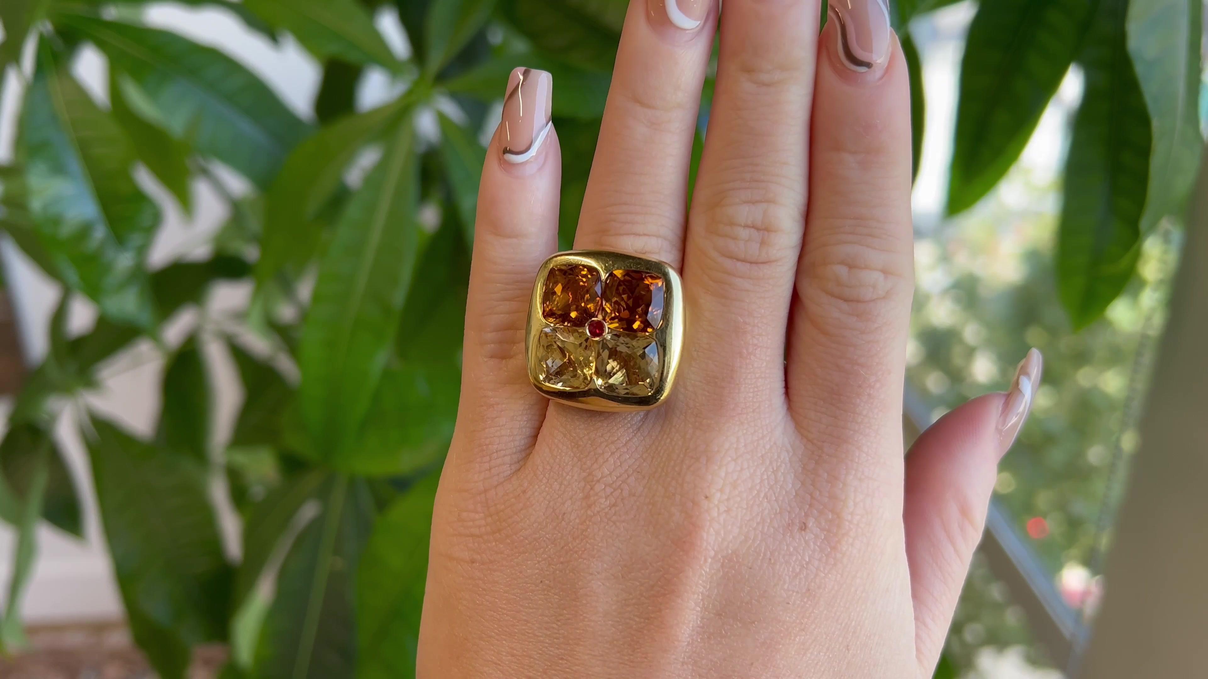 One Vintage Citrine Topaz 18 Karat Gold Cocktail Ring. Featuring two citrines and two topazes. Crafted in 18 karat yellow gold, with purity marks. Circa 1980s. The ring is a size 6 3/4 and may be resized.

About this Item: Dream of warm sunny days