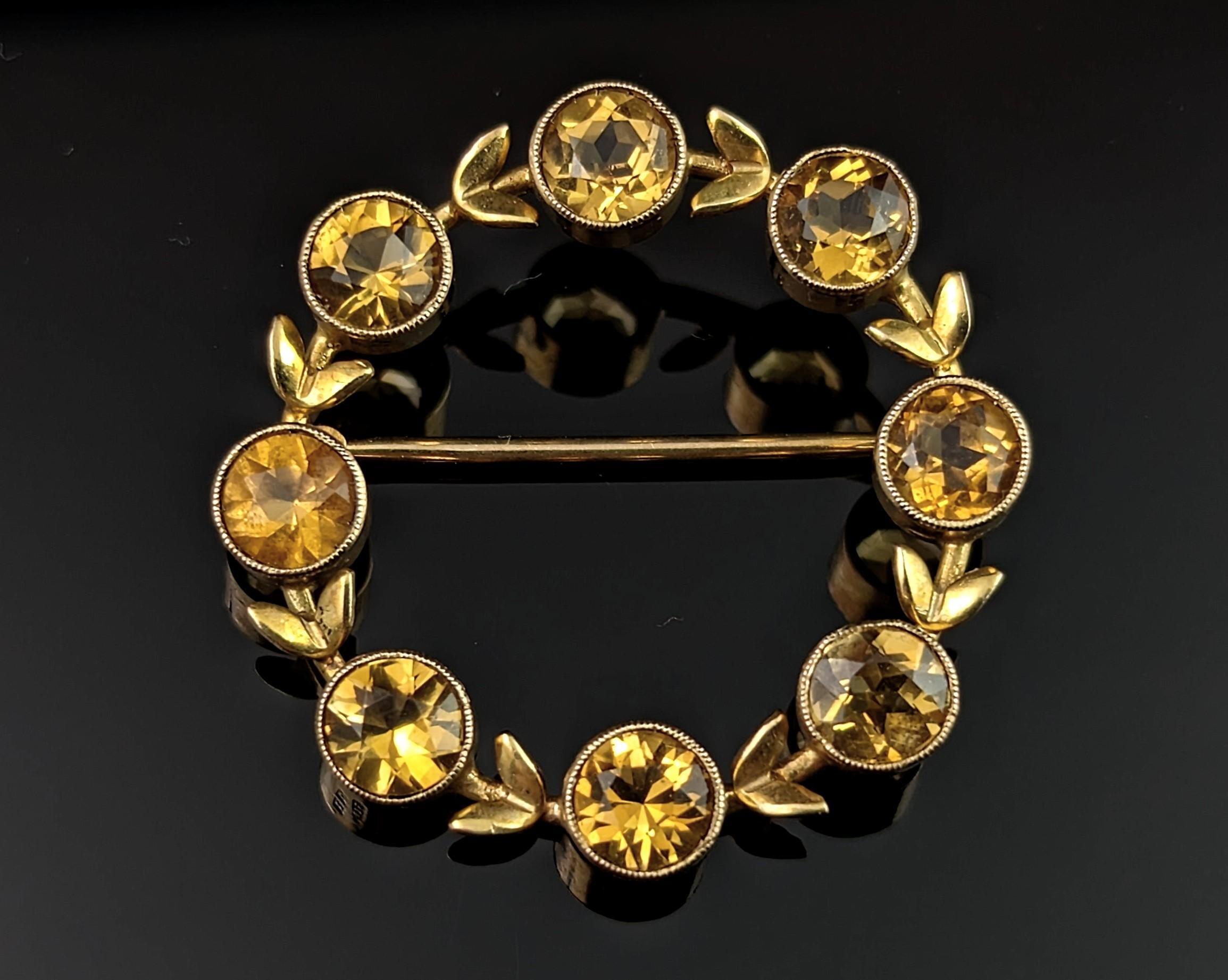 This beautiful vintage wreath brooch by Cropp and Farr is a real stunner, with the deep yellow Citrine and the rich 9kt yellow gold, this brooch really gives me a lovely warm feeling.

It is nicely designed as a circular shaped wreath with gold