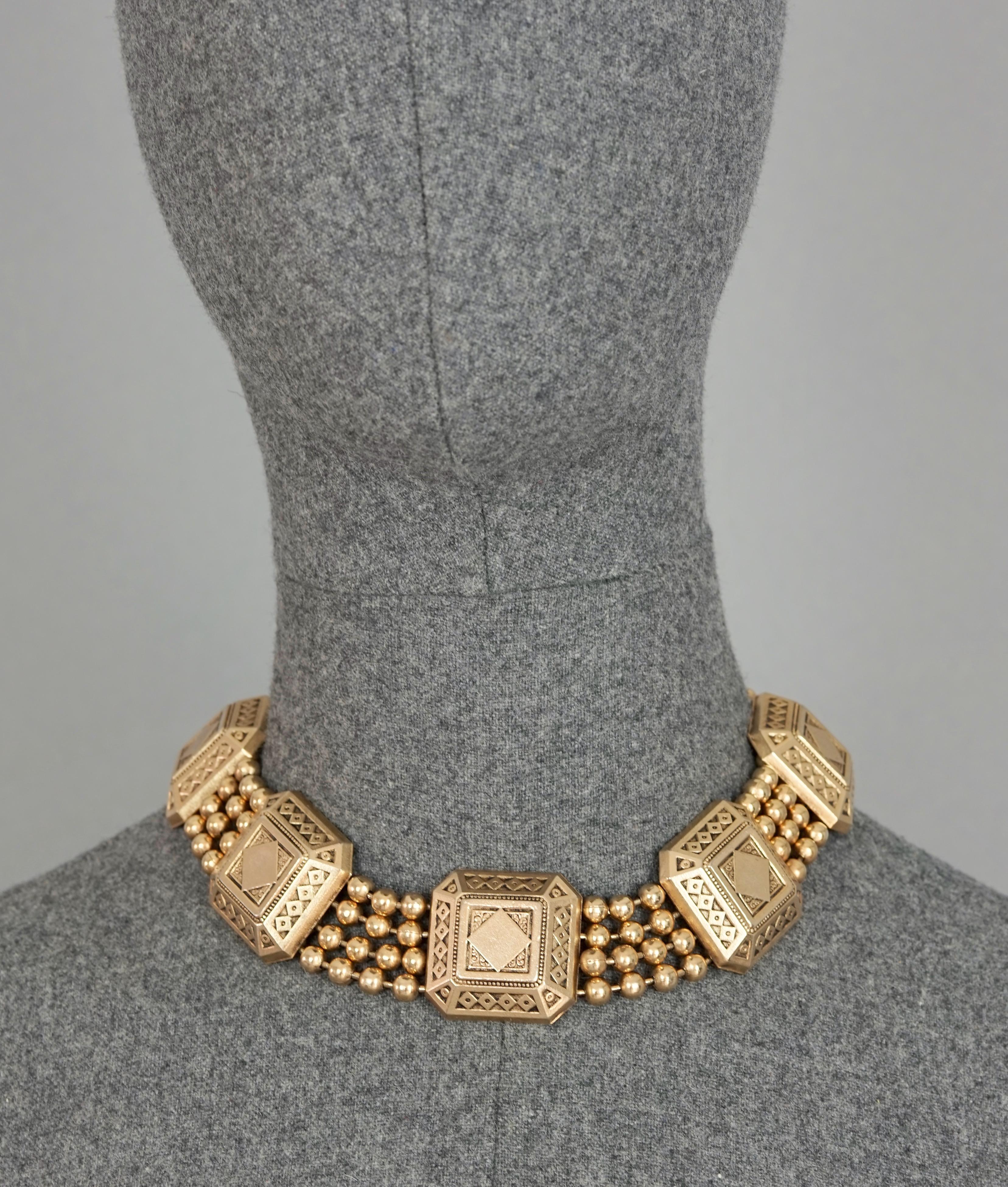 Vintage CLAIRE DEVE Square Charms Multi Layer Ball Chain Necklace

Measurements:
Height: 1.26 inches (3.2 cm)
Wearable Length: 15.55 inches (39.5 cm)

Features:
- 100% Authentic CLAIRE DEVE.
- Chunky square charms with 4 layers of ball chains